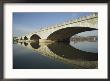 Graceful Arches Of The Arlington Memorial Bridge Reflected In The Potomac River by Stephen St. John Limited Edition Print