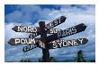 Sign Showing Directions To Other Cities In World, Koumac, New Caledonia by Jean-Bernard Carillet Limited Edition Pricing Art Print