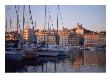 Sailboats In Port By Buildings, Marseille, France by Tamarra Richards Limited Edition Print