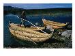 Aymara Boy On Reed Boat On Lake, Lake Titicaca, Puno, Peru by Eric Wheater Limited Edition Print