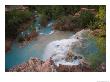 A Blue Waterfall Wets The Arid Landscape Of The Grand Canyonl by Taylor S. Kennedy Limited Edition Print