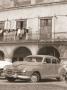 Car Near Building With Clothes by Nelson Figueredo Limited Edition Print