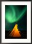 A Solitary Tepee Is Illuminated By The Aurora Borealis by Raymond Gehman Limited Edition Print
