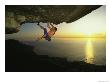 A Climber Scales A Big Roof On South Africas Table Mountain by Bill Hatcher Limited Edition Print