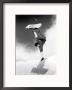 Snowboarder Doing A Handstand by Kurt Olesek Limited Edition Print