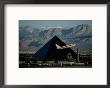 A Jet Flies Past The Luxor Hotel, The Worlds Fourth Largest Pyramid by Maria Stenzel Limited Edition Print