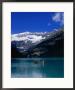 Canoeing Lake Louise In The Canadian Rockies, Lake Louise, Alberta, Canada by Jan Stromme Limited Edition Pricing Art Print