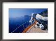 Deck Of Yacht Sailing Past Cliffs Of Gulf Of Orosei, Sardinia, Italy by Dallas Stribley Limited Edition Print