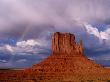 Rock Formation With Clouds Behind, Monument Valley Navajo Tribal Park, Arizona, Usa by Curtis Martin Limited Edition Print