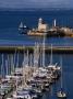 The 1814 Baily Lighthouse Can Be Seen In Howth Harbour, Dublin, Ireland by Doug Mckinlay Limited Edition Print