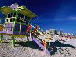 People On Beach Near Colourful Lifeguard Station, South Beach, Miami, Florida by Eddie Brady Limited Edition Print
