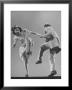 Kaye Popp And Stanley Catron Demonstrating A Step Of The Lindy Hop by Gjon Mili Limited Edition Print