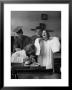 Hempstead High School Seniors Happily Helping Each Other With Graduation Gowns Before Commencement by Gordon Parks Limited Edition Print