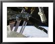 End Effector Of Endeavour's Robot Arm Appears Amidst Parts Of The International Space Station by Stocktrek Images Limited Edition Print