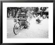 Cyclo In Old Hanoi, Vietnam by Walter Bibikow Limited Edition Print
