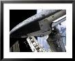 Space Shuttle Discovery Docked To The International Space Station by Stocktrek Images Limited Edition Pricing Art Print
