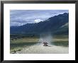 Truck On The Dalton Highway Following The Alyeska Pipeline, Alaska by Rich Reid Limited Edition Print