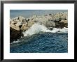 Wave Rolling Against Rock Jetty At Old Harbor On Block Island, Rhode Island by Todd Gipstein Limited Edition Pricing Art Print