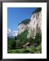 Lauterbrunnen And Staubbach Falls, Jungfrau Region, Switzerland by Roy Rainford Limited Edition Print