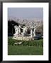 Monument To The Sardana, Montjuic, With Barcelona Skyline Beyond, Barcelona, Catalonia, Spain by Adina Tovy Limited Edition Print