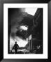 Man Walking In The Smokey Steel Mill by Nat Farbman Limited Edition Pricing Art Print
