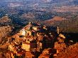 Mountain Top Village Bathed In Afternoon Sunlight, Speloncato, Corsica, France by David Tomlinson Limited Edition Print