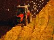 Tractor Driving On Field, York, East Riding Of Yorkshire, England by Jon Davison Limited Edition Print