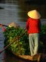 Women Rowing Boat Piled With Vegetables Along Mekong Delta, Vietnam by John Banagan Limited Edition Print