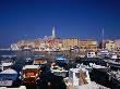 Boats In Harbour And Town In Distance On Adriatic Coast, Rovinj, Croatia by Jon Davison Limited Edition Pricing Art Print