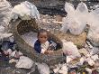 Baby In Bassinet Left At Dump, Mexico City, Mex by Alyx Kellington Limited Edition Print