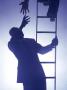 Silhouette Of Businessman Climbing Up Ladder by Chuck Carlton Limited Edition Print