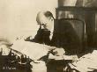 Vladimir Ilich Ulyanov Lenin Russian Statesman Reading A Copy Of Pravda In His Study by B.H. Aehuh Limited Edition Print