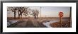 Stop Sign On A Road, Illinois, Usa by Panoramic Images Limited Edition Print