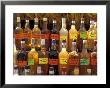 Bottles Of Local Rum Drinks At Le Diamant Village, Martinique, West Indies, Caribbean by Guy Thouvenin Limited Edition Print