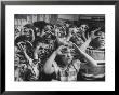Classroom Full Of Students Circling Fingers Around Eyes In Form Of Glasses During Music Class by Francis Miller Limited Edition Print