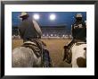 Cowboys On Horseback At Cody Night Rodeo, Cody, Wyoming by Lee Foster Limited Edition Print
