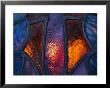 Sunset Illuminates A Stained Glass Window Of A Church by Raymond Gehman Limited Edition Print