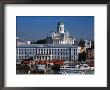 Boats On Waterfront And Lutheran Church In Distance, Helsinki, Finland by Wayne Walton Limited Edition Print