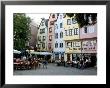 People Sitting At Outdoor Restaurant In The Old Town, Cologne, Germany by Yadid Levy Limited Edition Print