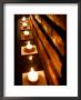 Lighted Candles And Brick Wall by Michele Molinari Limited Edition Pricing Art Print