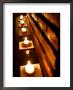 Lighted Candles And Brick Wall by Michele Molinari Limited Edition Print