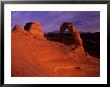Hikers View Delicate Arch At Sunset, Utah, Usa by Jerry Ginsberg Limited Edition Print