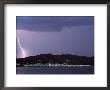 A Lightning Bolt Strikes The Mountains Behind A Town Of Costa Brava by Pablo Corral Vega Limited Edition Print