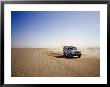 Four-Wheel Drive Landrover, Off-Roading In The Desert, Algeria, Africa by Geoff Renner Limited Edition Print