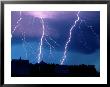 Lightning Fills The Night Sky Near Walton by Joel Sartore Limited Edition Pricing Art Print