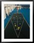 Woman Playing Shuffleboard Game On A Cruise Ship by Todd Gipstein Limited Edition Print