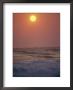 Surf Breaks On A Beach At Sunset by Raul Touzon Limited Edition Print