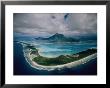 Aerial View Of Bora-Bora, Its White Beaches Ringed By A Coral Reef by Jodi Cobb Limited Edition Pricing Art Print