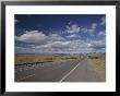 A Scenic Of Route 40 Passing Through An Arizona Desert by Roy Gumpel Limited Edition Print