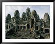 Monks In Orange Robes Stand On The Step Outside A Buddhist Temple by Paul Chesley Limited Edition Print